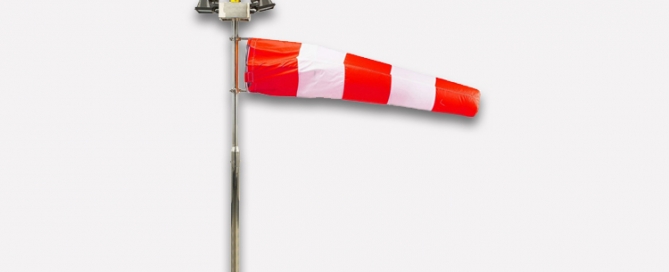 red and white windsock to show wind direction. important for aviation warning