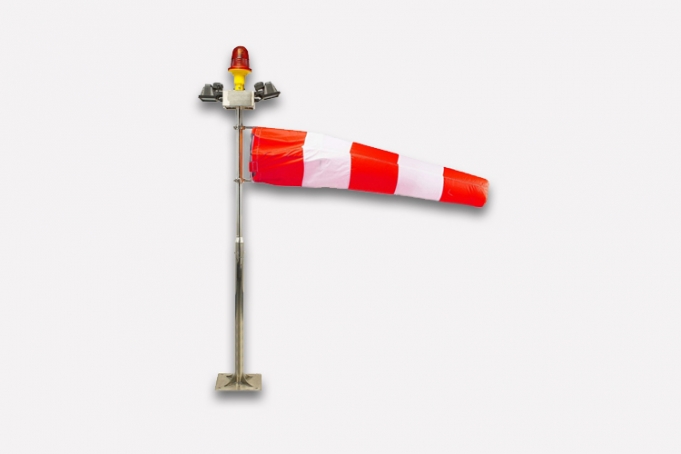 red and white windsock to show wind direction. important for aviation warning